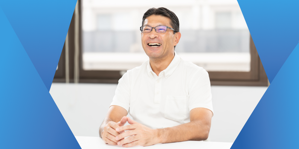東京の賃貸オフィスの利用についてのインタビューに真摯に応じる株式会社ディジタルの執行役員、熊倉慎一氏