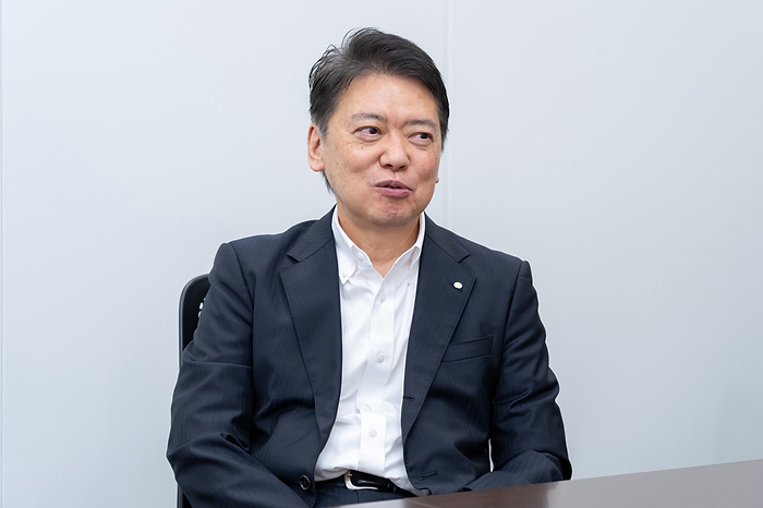 インタビューに答える株式会社ワイズ 取締役副社長 日根野雅敏氏